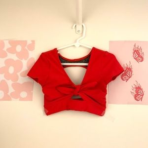 Five DANCEWEAR red tie front crop top